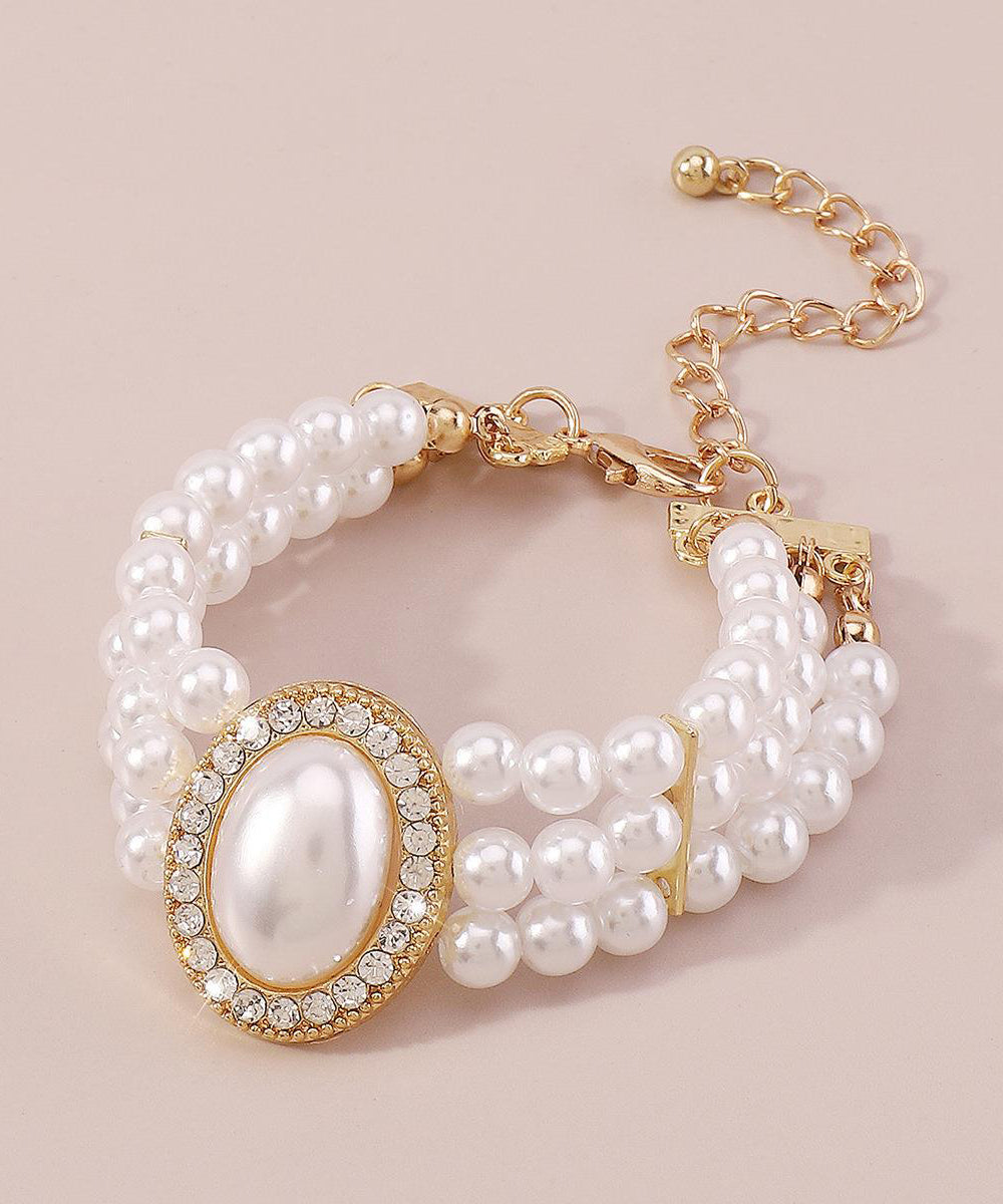 Elegant Gold Copper Alloy Pearl Zircon Resin Tassel Chain Bracelet YI001