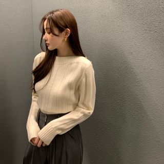 Haut en tricot uni à manches longues et col ras du cou