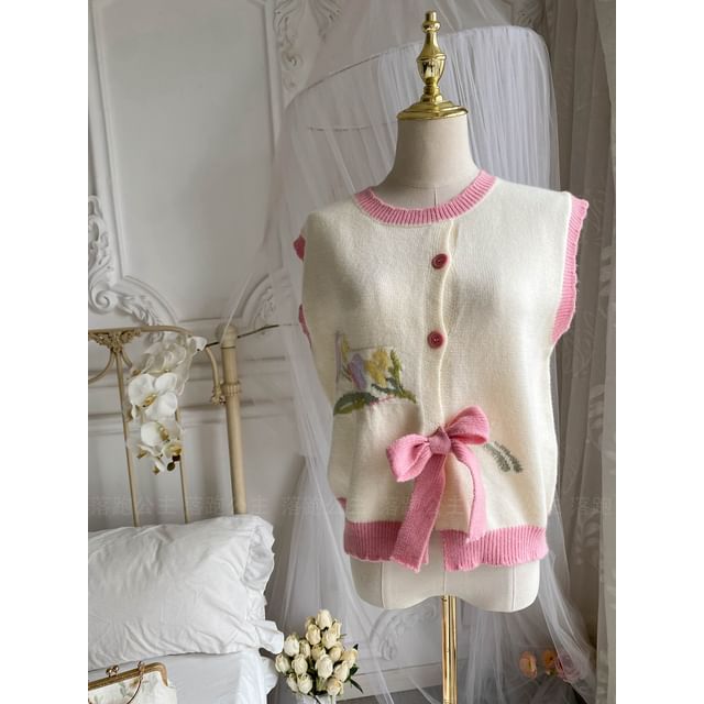 Robe trapèze mi-longue à manches longues et col uni avec nœud et boutons / Gilet pull à boutons fleuris à col ras du cou