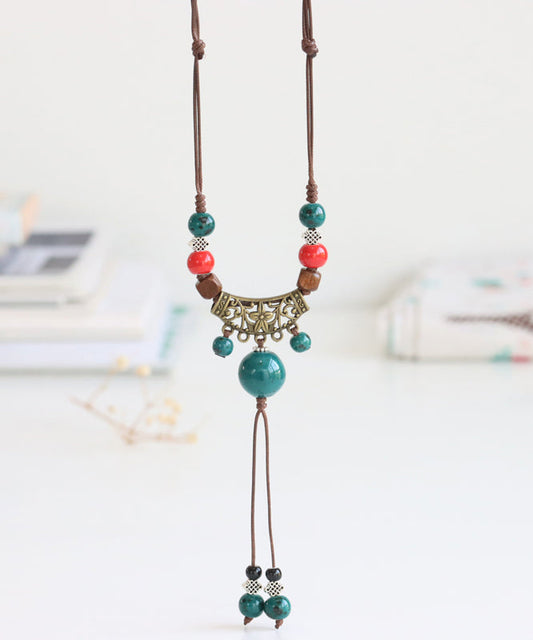 Handmade Bronze Coppery Woven Ceramics Hollow Out Tassel Pendant Necklace TX006