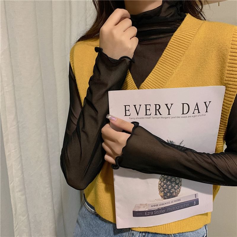 Haut transparent uni à manches longues et col montant