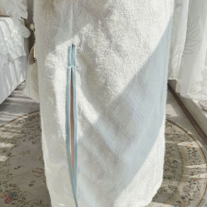 Qipao longue en dentelle brodée florale à manches longues