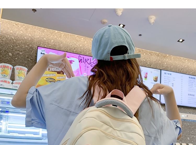 Sac à dos zippé à blocs de couleurs