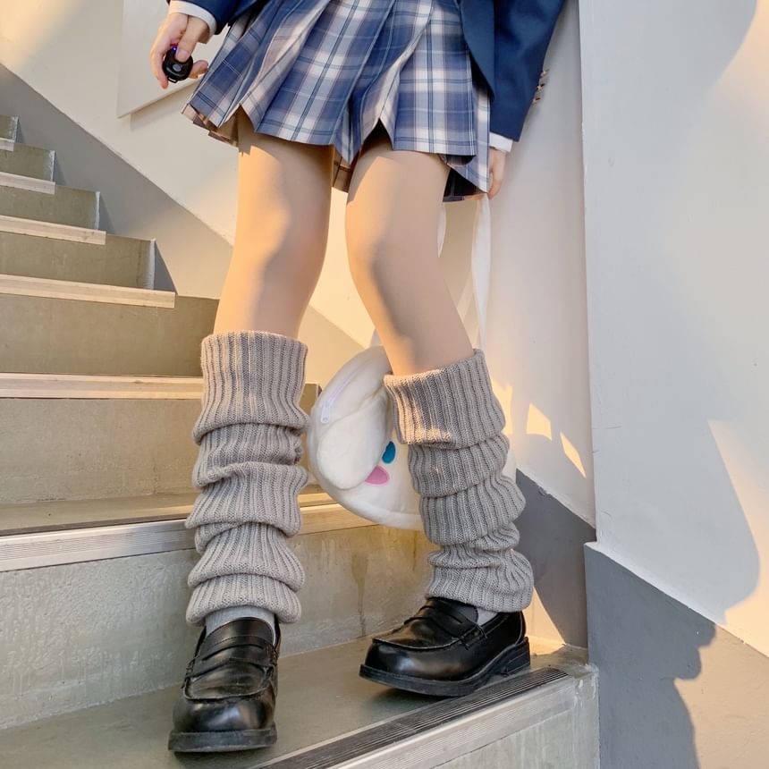 Jambières à pompons