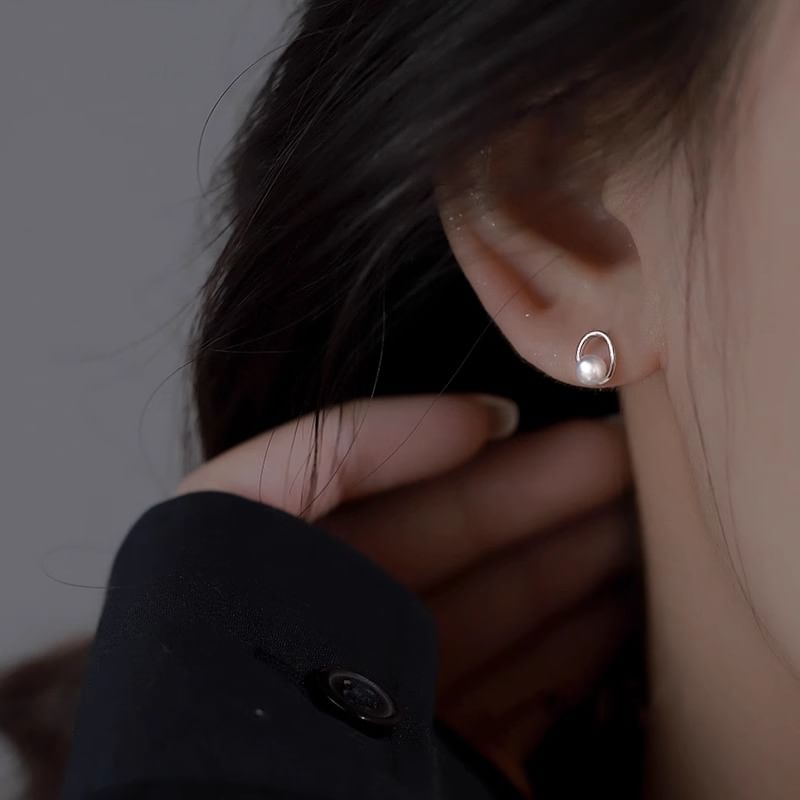 Clous d'oreilles en fausses perles