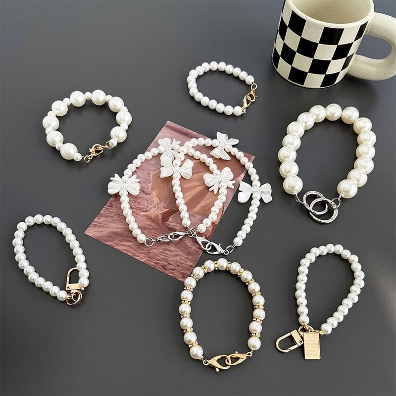 Faux (Various Strap Phone Pearl Designs)