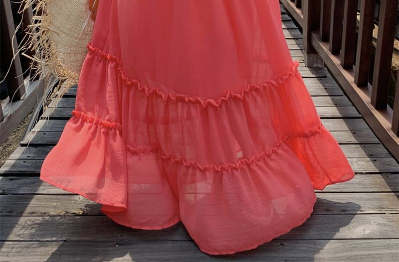Robe longue à volants et découpes unies