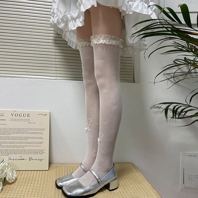 Strümpfe mit Spitzenbesatz und Schmetterlings-Print