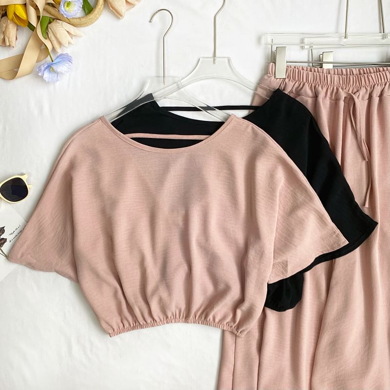 Set: Short-Sleeve Crew Neck Plain Open Back Crop Tee + Elastic Waist Wide Leg Pants