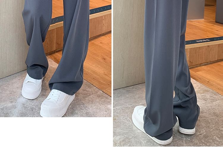 Hochgeschnittene, schlichte Hose mit weitem Bein