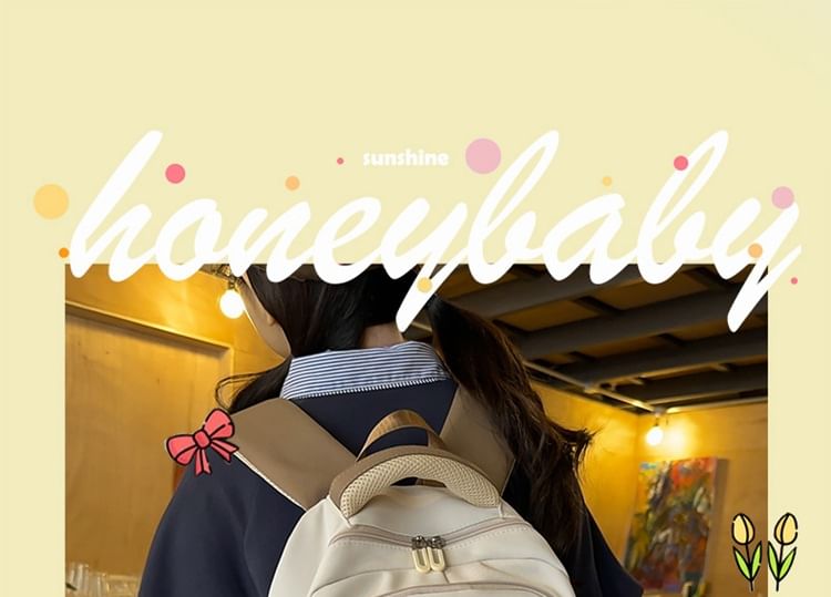 Lettering Applique Buckled Nylon Backpack