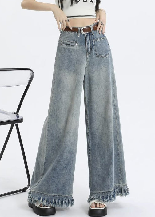 Pantalon large bleu clair avec poches à pompons et fermeture éclair