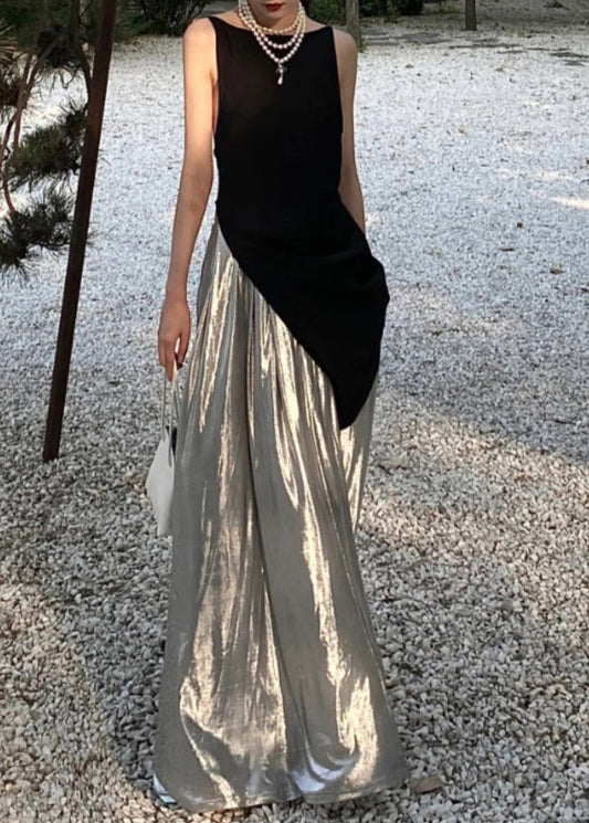 Ensemble deux pièces en coton avec haut asymétrique noir sexy et pantalon argenté sans manches