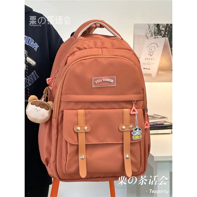 Lettering Label Buckled Flap Laptop Backpack