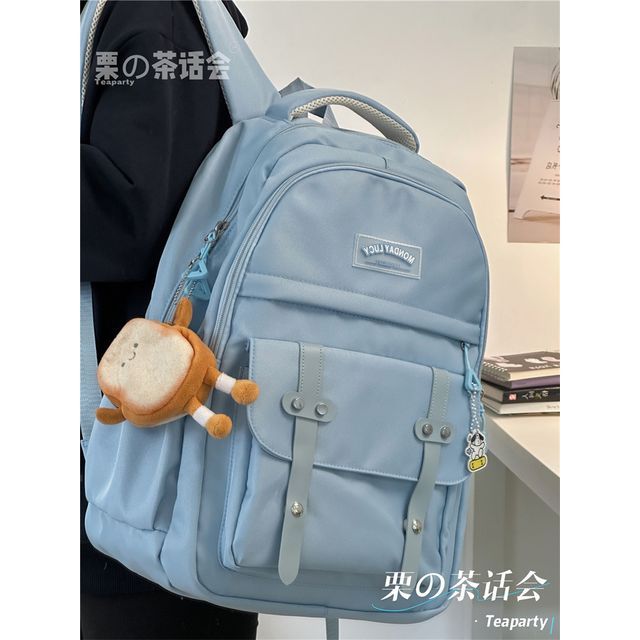 Lettering Label Buckled Flap Laptop Backpack