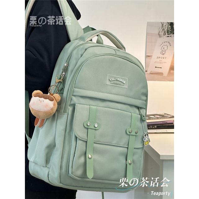 Lettering Label Buckled Flap Laptop Backpack