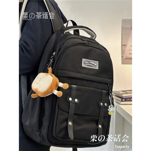 Lettering Label Buckled Flap Laptop Backpack