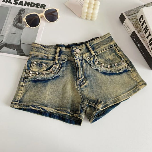 High Waist Jeansshorts mit verwaschenen Nieten