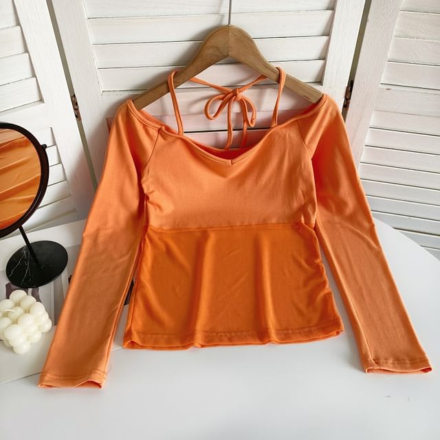 T-shirt à manches longues avec empiècement en maille et épaules dénudées