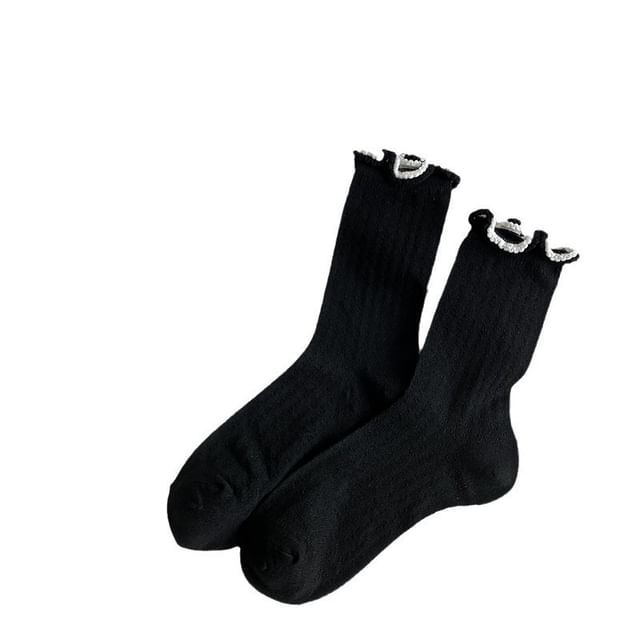 Einfarbige Socken mit gekräuseltem Rand